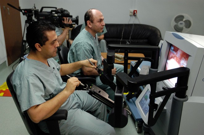 e14404ap_Anvari_at_console_photo
