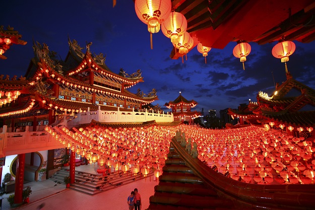 Lanterns are hung in a Chinese temple ahead of Chinese New Year celebrations in Kuala Lumpur January 30, 2014. According to the Chinese lunar calendar, the Chinese New Year, which welcomes the year of the horse, falls on January 31 this year. REUTERS/Samsul Said (MALAYSIA - Tags: RELIGION TPX IMAGES OF THE DAY SOCIETY ANNIVERSARY) - RTX1810X